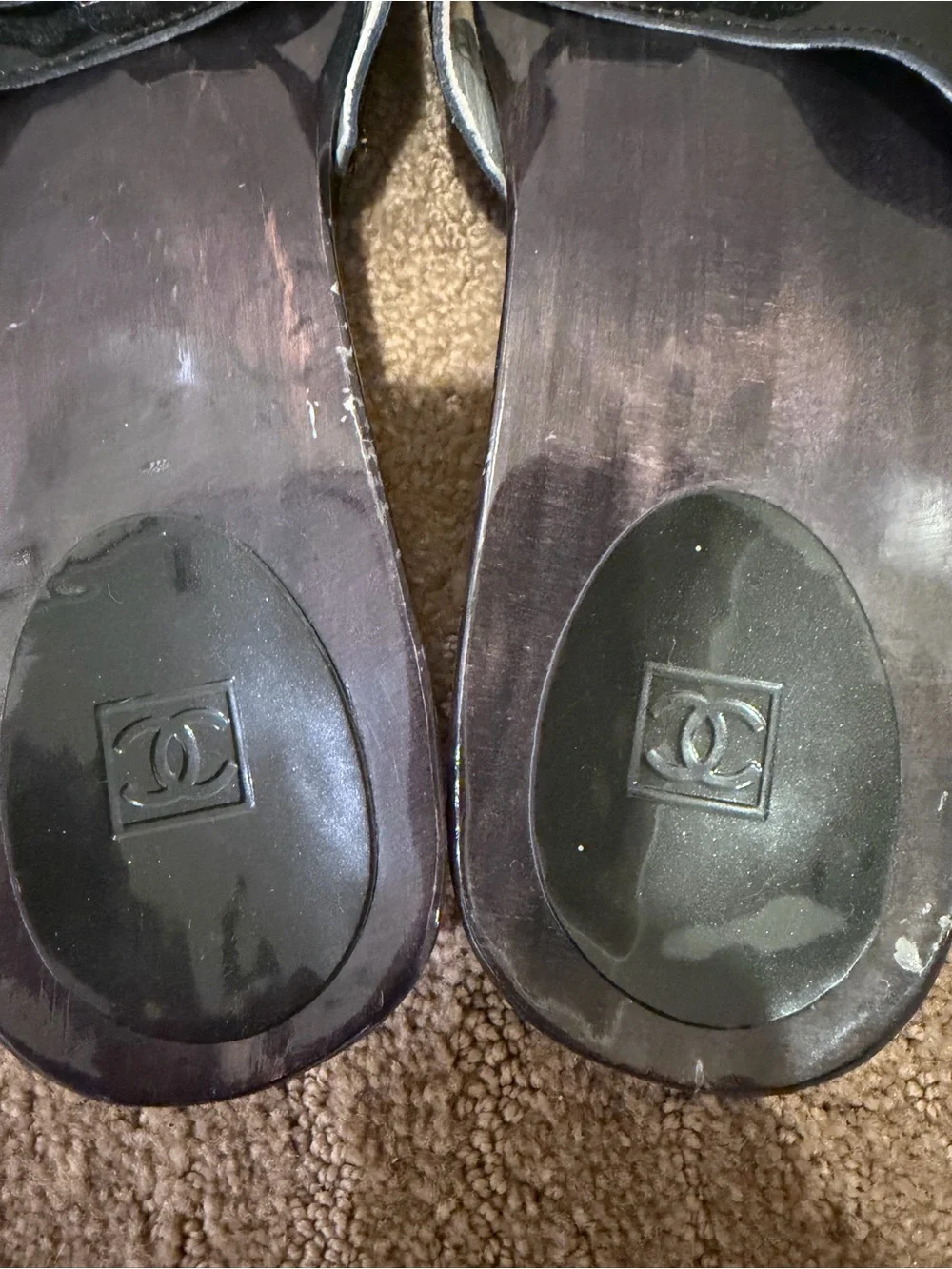CHANEL Black Patent Leather Slide Mules with Silver Logo Plaque